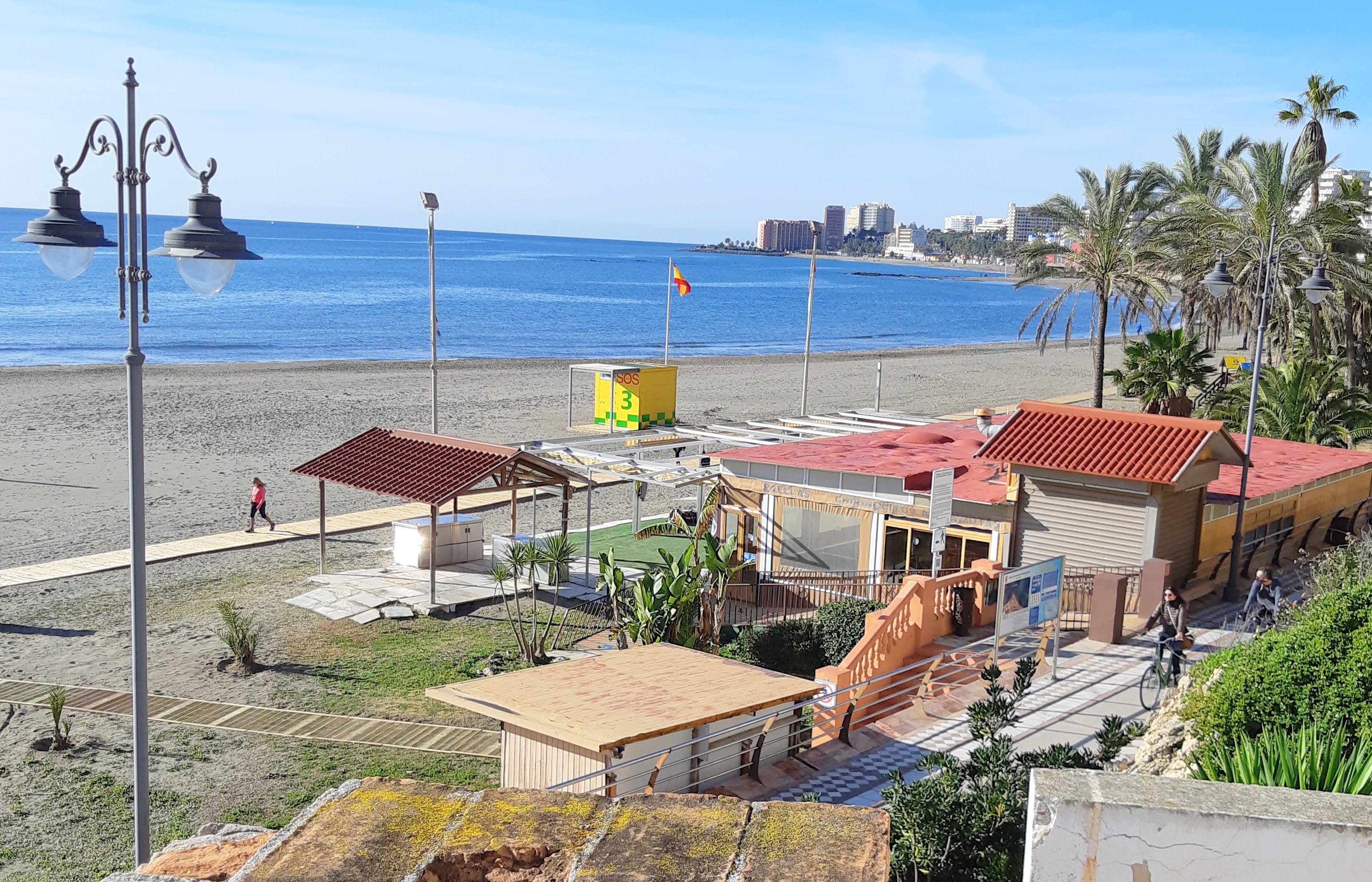 View of promenade restaurants from the terrace of beachfront loft apartment in Benalmádena Costa del Sol